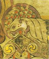 Folio 029r, Symboles eucharistiques dans la gueule d'un lion